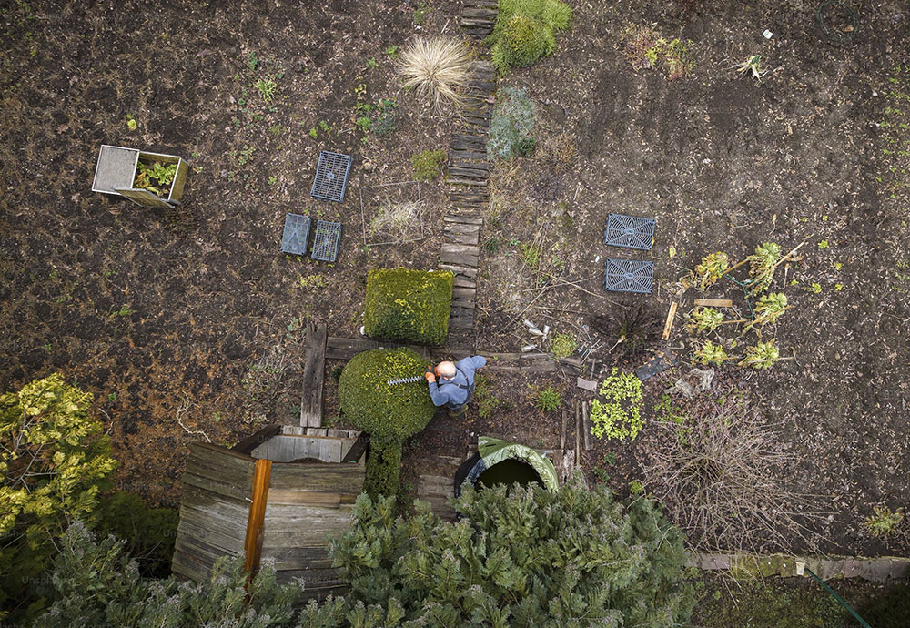 man doing landscaping aerial drone photograph